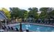 Community pool with lounge chairs offers a relaxing outdoor experience at 1104 Barrow Nook Ct, Apex, NC 27502