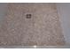 Shower features mosaic tile floor and glass enclosure at 1104 Barrow Nook Ct, Apex, NC 27502
