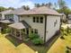 The house features a covered patio and a backyard with fresh mulch at 111 Chapel Run Way, Chapel Hill, NC 27517