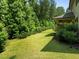 This property features a lush green backyard, perfect for enjoying outdoor activities and relaxing at 111 Chapel Run Way, Chapel Hill, NC 27517