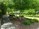 The community park features a pergola and lush gardens, perfect for relaxing walks and enjoying nature at 111 Chapel Run Way, Chapel Hill, NC 27517