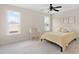 Inviting bedroom with a desk, carpeted floor, and windows for natural light at 111 Streamside Dr, Sanford, NC 27330