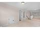 Upstairs hallway features access to bedrooms and carpet at 111 Streamside Dr, Sanford, NC 27330