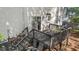 Spacious back deck with outdoor seating and grill, connected to the house with stairs and a sliding door at 112 Fairford Dr, Holly Springs, NC 27540