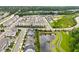 Neighborhood aerial view reveals modern homes with lake views at 113 Mazarin Ln, Cary, NC 27519