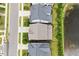 Bird's-eye view displaying well-kept homes, landscaping, and proximity to a serene pond at 113 Mazarin Ln, Cary, NC 27519