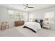 Serene bedroom with neutral tones, large windows, and comfortable furnishings at 113 Mazarin Ln, Cary, NC 27519
