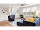 Cozy living room with fireplace, built-ins, and plush blue seating at 113 Mazarin Ln, Cary, NC 27519