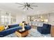 Spacious living area open to the kitchen with modern decor and ample seating at 113 Mazarin Ln, Cary, NC 27519