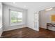 Bright office featuring hardwood floors, natural light, and a french door to another room at 113 Mazarin Ln, Cary, NC 27519