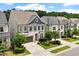 Attractive street view featuring landscaped yards and well maintained two story homes with garages at 113 Mazarin Ln, Cary, NC 27519