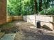 View of backyard with wood fence enclosing the yard and a covered grill in the corner at 114 Oxpens Rd, Cary, NC 27513