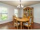 Traditional dining room with a wooden table, chairs, and a china cabinet at 114 Oxpens Rd, Cary, NC 27513
