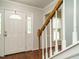 Inviting foyer with decorative glass door and staircase at 114 Oxpens Rd, Cary, NC 27513