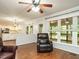 Comfortable living room with a view into the kitchen and out to the screened deck at 114 Oxpens Rd, Cary, NC 27513