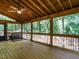 Enjoy the outdoors on this screened-in deck overlooking a lush backyard at 114 Oxpens Rd, Cary, NC 27513