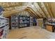 Organized attic storage space with shelving units, plenty of room, and easy access at 1208 Hunting Ridge Rd, Raleigh, NC 27615