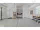 Garage features epoxy flooring, built-in storage, and ample space at 1208 Hunting Ridge Rd, Raleigh, NC 27615