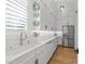 Elegant kitchen featuring quartz countertops, stainless steel appliances, and under-cabinet lighting at 1208 Hunting Ridge Rd, Raleigh, NC 27615