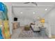 Cozy upstairs living room with comfortable seating, tv, and soft carpeting at 1208 Hunting Ridge Rd, Raleigh, NC 27615