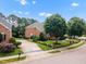 Aerial view of home with driveway and landscaping at 12140 Pawleys Mill Cir, Raleigh, NC 27614