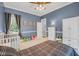 Spacious bedroom featuring a neutral color palette and a large window at 12140 Pawleys Mill Cir, Raleigh, NC 27614