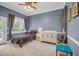 Comfortable bedroom with a large window and ample space at 12140 Pawleys Mill Cir, Raleigh, NC 27614