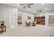 Bright bonus room with neutral walls and carpet, ceiling fans, and view of the bedroom and bathroom at 12140 Pawleys Mill Cir, Raleigh, NC 27614