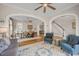 Open-concept living area with elegant archways, stairs and hardwood floors at 12140 Pawleys Mill Cir, Raleigh, NC 27614