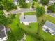 Aerial view of a one-story home featuring a well-manicured backyard, and proximity to surrounding neighborhood amenities at 124 Roscommon Ln, Clayton, NC 27520