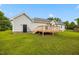 View of the rear of the house featuring a nice backyard and deck at 124 Roscommon Ln, Clayton, NC 27520