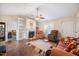 Inviting living room featuring a fireplace with built-in shelves and comfortable seating at 124 Roscommon Ln, Clayton, NC 27520