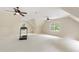 Bonus room with gym equipment and multiple ceiling fans at 131 Lavinia Ln, Chapel Hill, NC 27516