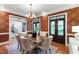 Well-appointed dining area with hardwood floors, stylish wallpaper and natural lighting at 131 Lavinia Ln, Chapel Hill, NC 27516