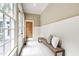 Hallway features light tile, seating, and large windows at 131 Lavinia Ln, Chapel Hill, NC 27516