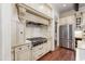 Well-equipped kitchen features stainless steel appliances, a tile backsplash and cream-colored cabinetry at 131 Lavinia Ln, Chapel Hill, NC 27516