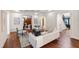 Elegant living room with hardwood floors, neutral decor, and seamless flow to adjoining spaces at 131 Lavinia Ln, Chapel Hill, NC 27516