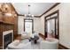 Well-appointed living room featuring hardwood floors, recessed lights and refined millwork at 131 Lavinia Ln, Chapel Hill, NC 27516