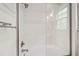 Luxurious bathroom shower with white subway tile and modern fixtures at 131 Lavinia Ln, Chapel Hill, NC 27516