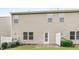 Exterior of home, featuring a patio, grass, vinyl siding and manicured lawn at 133 Explorer Dr # 258, Morrisville, NC 27560