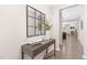 Well-lit foyer with a console table and decor, leading into the home's living areas at 133 Explorer Dr # 258, Morrisville, NC 27560