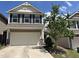 Two story home with attached two car garage, and landscaping on a clear day at 133 Explorer Dr # 258, Morrisville, NC 27560