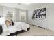 Modern main bedroom features large windows, soft carpet, and stylish decor at 133 Explorer Dr # 258, Morrisville, NC 27560