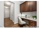 Convenient home office space with built-in cabinetry, desk area, and modern finishes at 133 Explorer Dr # 258, Morrisville, NC 27560