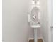 Chic powder room features a pedestal sink and stylish mirror at 133 Explorer Dr # 258, Morrisville, NC 27560