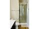 This bathroom showcases a glass shower, dark vanity, and a matching towel rack at 142 Philips Sq, Chapel Hill, NC 27516