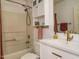 Well-maintained bathroom with a combined shower and tub and ample storage at 1509 Elkpark Dr, Raleigh, NC 27610