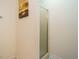 Compact bathroom featuring a glass enclosed shower stall and neutral finishes at 1509 Elkpark Dr, Raleigh, NC 27610