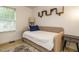 Cozy bedroom with soft natural light, a comfortable daybed and a stylish rug at 1509 Elkpark Dr, Raleigh, NC 27610