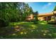 Expansive backyard with deck, mature trees, and plenty of room for recreation at 1511 Hatch Rd, Chapel Hill, NC 27516